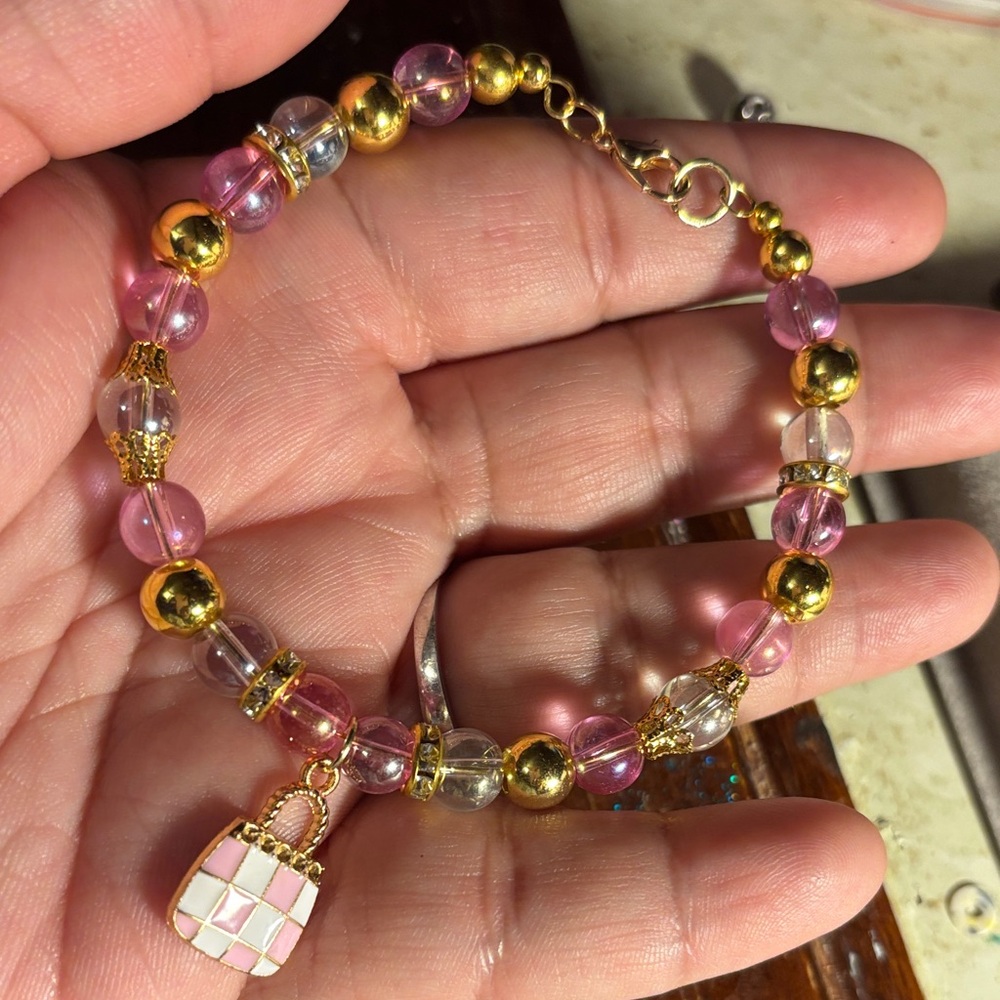 Chic Pink and Gold Beaded Bracelet with Purse Charm